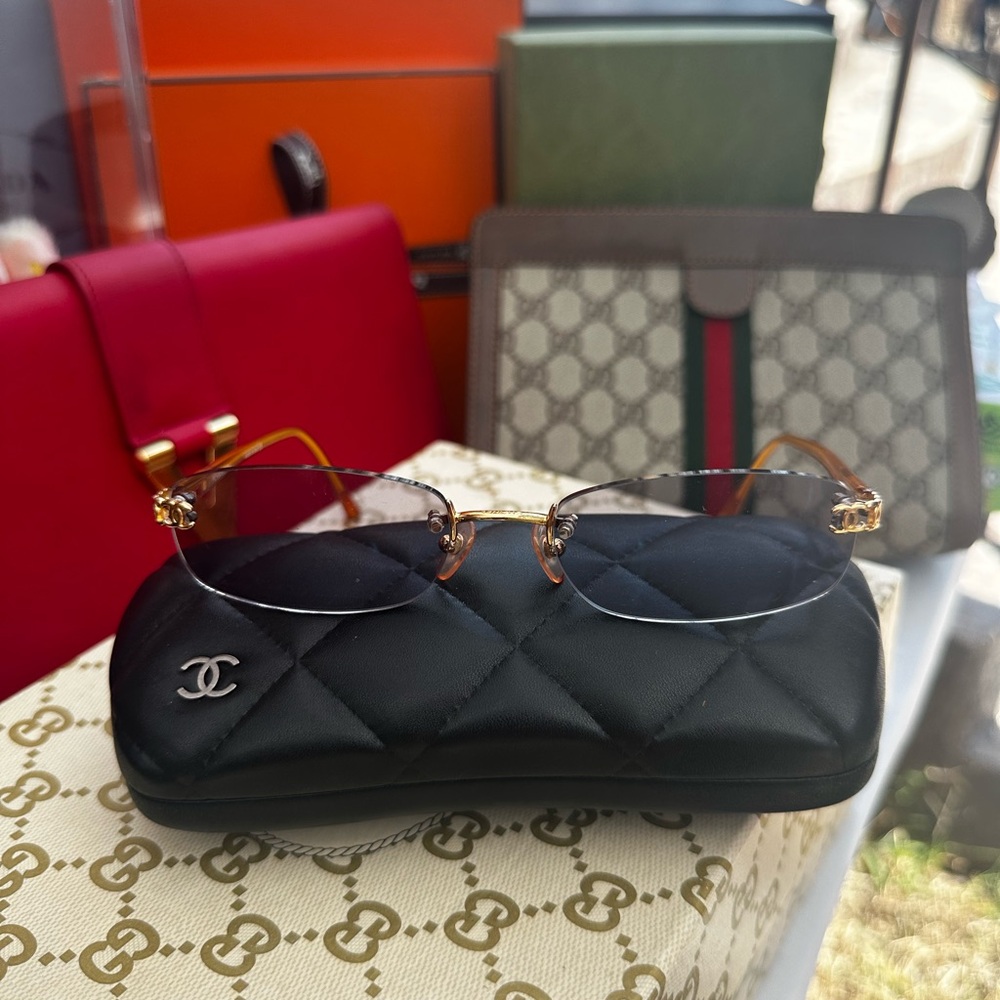 CHANEL Rimless Glasses with Gold and Brown Accents